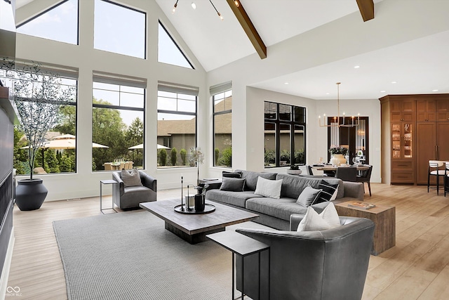 7116 Trail Ridge Ln, Indianapolis, IN 46259 - living room featuring a chandelier, high vaulted ceiling, light wood finished floors, beamed ceiling, and recessed lighting
