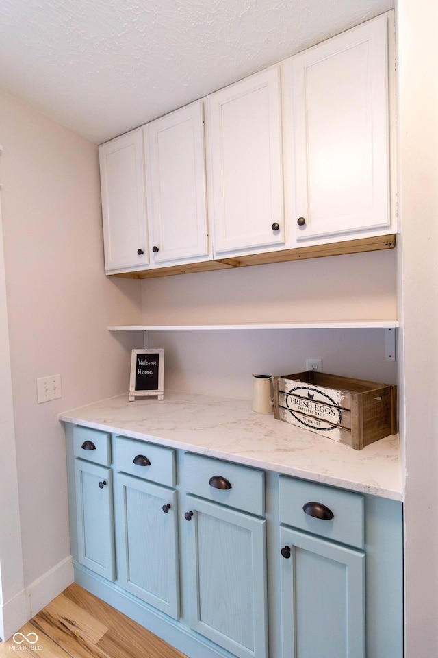 2935 N Grizzly Ln, Martinsville, IN 46151 - bar with light wood finished floors and baseboards