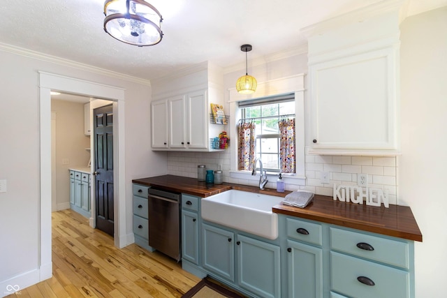 2935 N Grizzly Ln, Martinsville, IN 46151 - kitchen with butcher block countertops, a sink, blue cabinetry, dishwasher, and light wood-style flooring