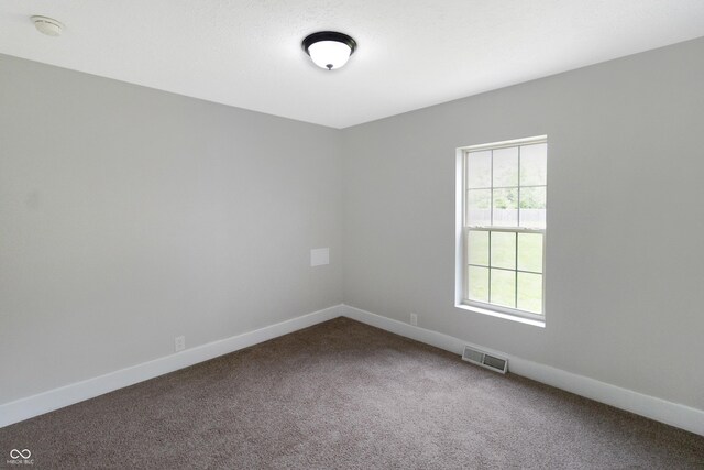2935 N Grizzly Ln, Martinsville, IN 46151 - carpeted empty room with a smoke detector and baseboards