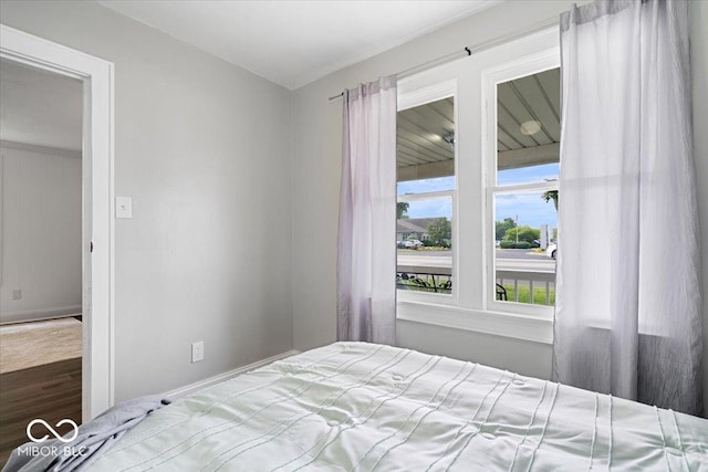 606 E County Line Rd, Indianapolis, IN 46227 - bedroom with wood finished floors and baseboards
