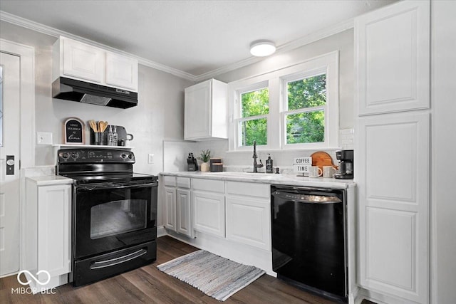 606 E County Line Rd, Indianapolis, IN 46227 - kitchen featuring black appliances, under cabinet range hood, light countertops, dark wood-type flooring, and white cabinets
