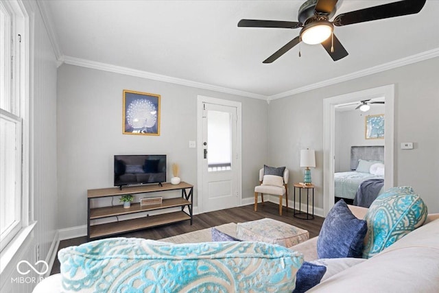 606 E County Line Rd, Indianapolis, IN 46227 - living area with ornamental molding, a ceiling fan, wood finished floors, and healthy amount of natural light