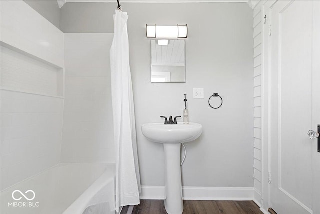 606 E County Line Rd, Indianapolis, IN 46227 - full bathroom featuring wood finished floors and shower / bath combo with shower curtain