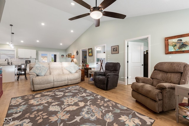 1959 Sophia Ln, Seymour, IN 47274 - living room with ceiling fan, light wood-style floors, recessed lighting, and high vaulted ceiling