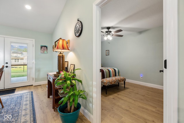 1959 Sophia Ln, Seymour, IN 47274 - entrance foyer featuring light wood-style flooring, baseboards, ceiling fan, and lofted ceiling