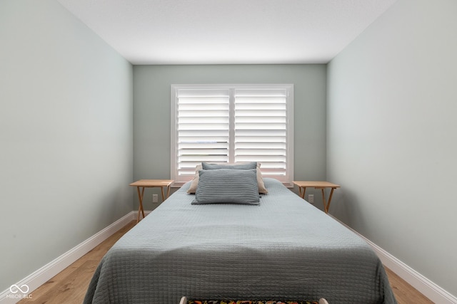 1959 Sophia Ln, Seymour, IN 47274 - bedroom featuring light wood finished floors and baseboards