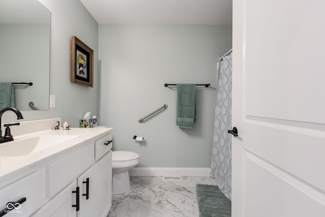 1959 Sophia Ln, Seymour, IN 47274 - full bathroom featuring marble look tile flooring, toilet, vanity, and baseboards