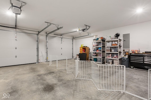 1959 Sophia Ln, Seymour, IN 47274 - garage with electric panel and a garage door opener