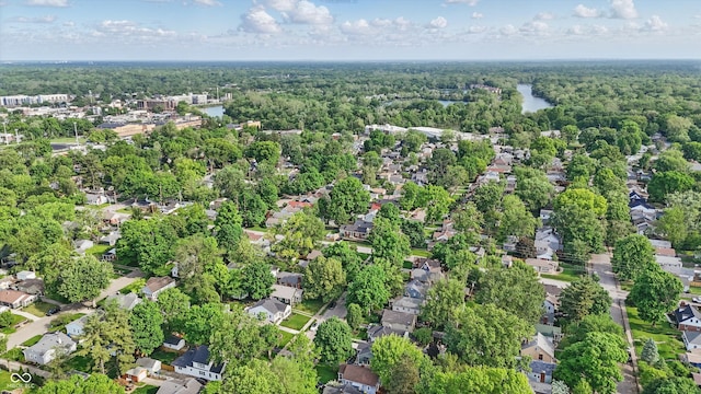 aerial view of residential area with a forest