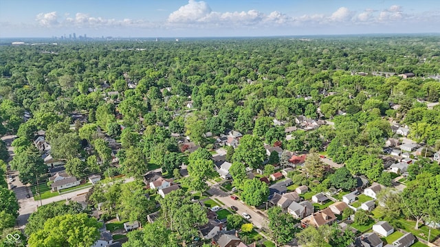 aerial view of property's location with a forest