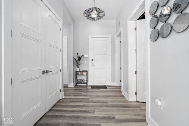15 W Executive Dr Unit 101, Carmel, IN 46032 - hall with wood finished floors and baseboards