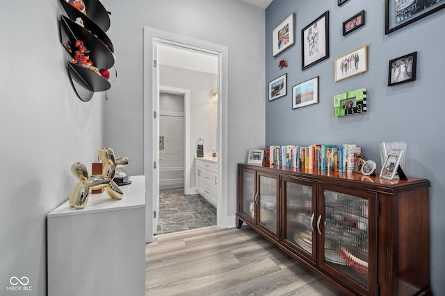 15 W Executive Dr Unit 101, Carmel, IN 46032 - hall featuring baseboards and wood finished floors