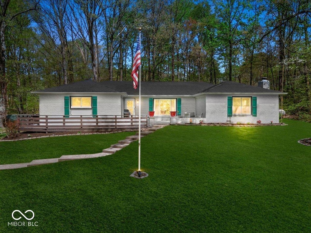 8581 N Goat Hollow Rd, Mooresville, IN 46158 - ranch-style house with a front yard and a chimney
