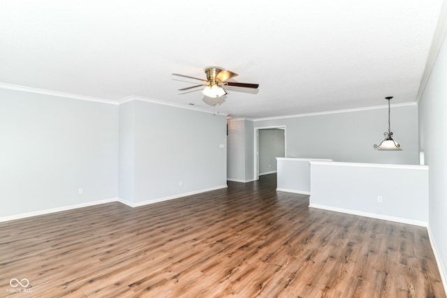 12612 Majestic Way, Fishers, IN 46037 - unfurnished living room with wood finished floors, ceiling fan, baseboards, and crown molding