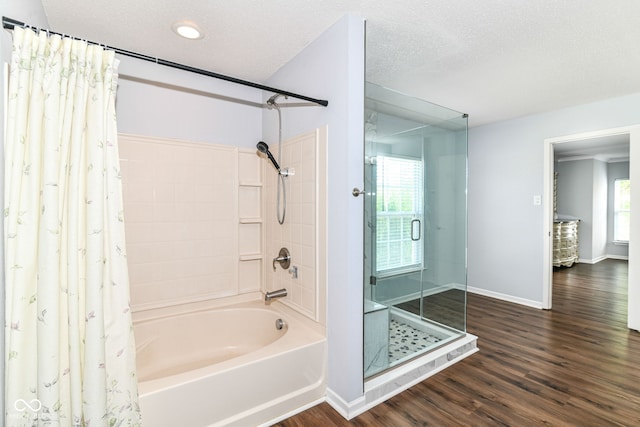 12612 Majestic Way, Fishers, IN 46037 - full bath with baseboards, wood finished floors, shower / bath combination with curtain, and a textured ceiling