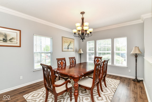 12612 Majestic Way, Fishers, IN 46037 - dining room featuring a chandelier, ornamental molding, healthy amount of natural light, dark wood-type flooring, and baseboards