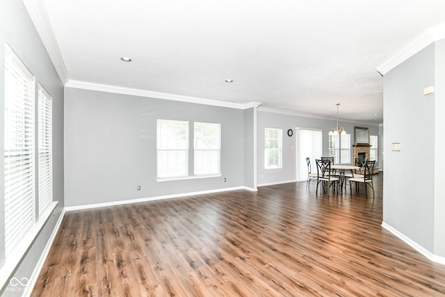 12612 Majestic Way, Fishers, IN 46037 - unfurnished living room featuring wood finished floors, baseboards, ornamental molding, a chandelier, and recessed lighting