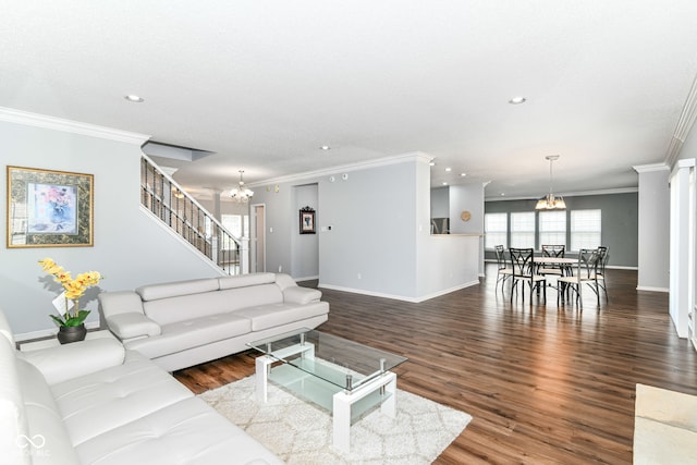 12612 Majestic Way, Fishers, IN 46037 - living room featuring a chandelier, crown molding, recessed lighting, baseboards, and wood finished floors