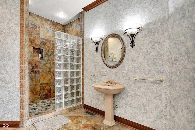 893 W 500 S, Anderson, IN 46013 - full bathroom with walk in shower, baseboards, stone finish floors, and a sink
