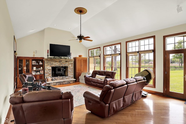 893 W 500 S, Anderson, IN 46013 - living room with wood finished floors, ceiling fan, baseboards, high vaulted ceiling, and a fireplace