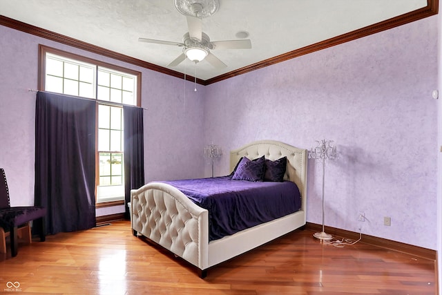 893 W 500 S, Anderson, IN 46013 - bedroom featuring multiple windows, light wood finished floors, ornamental molding, baseboards, and a ceiling fan