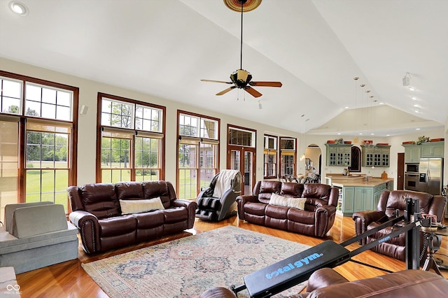 893 W 500 S, Anderson, IN 46013 - living room featuring lofted ceiling, ceiling fan, light wood-style flooring, recessed lighting, and arched walkways