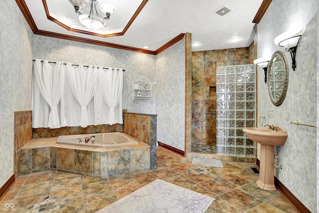893 W 500 S, Anderson, IN 46013 - bathroom with crown molding, a garden tub, a walk in shower, stone finish floors, and baseboards