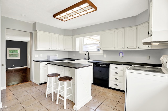8853 S County Road 825 E, Cloverdale, IN 46120 - kitchen with dishwasher, white electric range oven, light tile patterned floors, and dark countertops