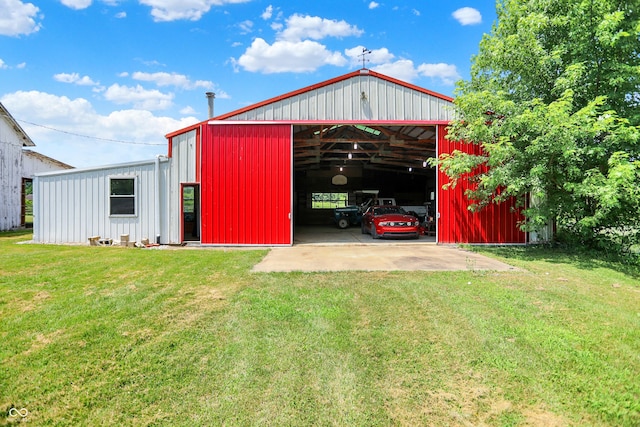 8853 S County Road 825 E, Cloverdale, IN 46120 - view of pole building with a lawn and driveway