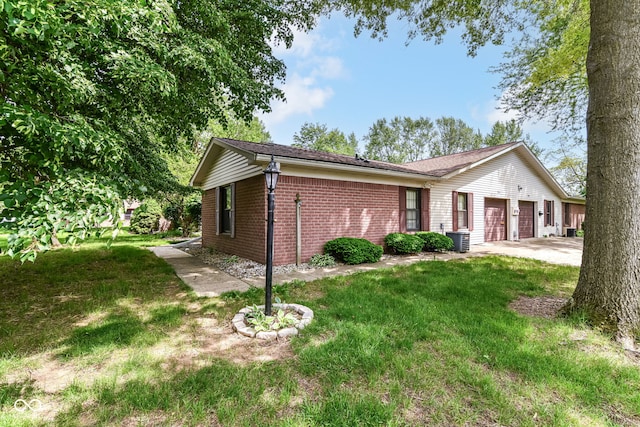 4504 Harvard Dr, Anderson, IN 46013 - view of front of home featuring a garage, central AC unit, brick siding, a front lawn, and driveway
