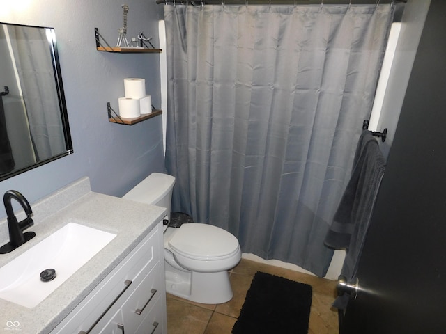 1612 Prairieview Ln, Greenfield, IN 46140 - bathroom featuring vanity, tile patterned flooring, and curtained shower