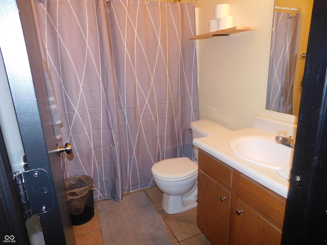 1612 Prairieview Ln, Greenfield, IN 46140 - full bath featuring vanity, tile patterned flooring, and a shower with shower curtain