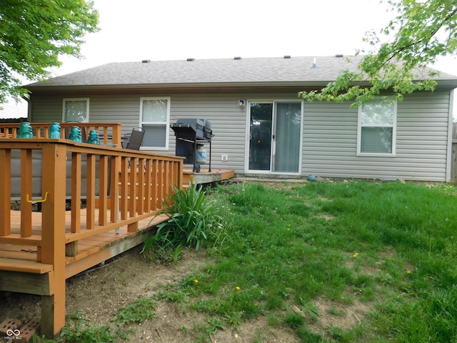 1612 Prairieview Ln, Greenfield, IN 46140 - rear view of house with a deck and a shingled roof