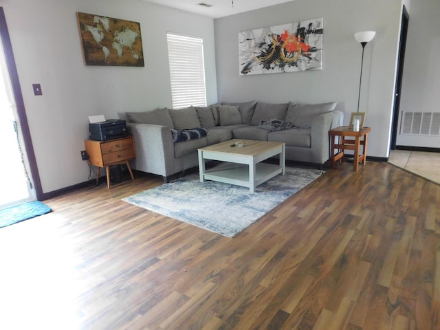 1612 Prairieview Ln, Greenfield, IN 46140 - living area featuring wood finished floors and baseboards