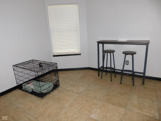1612 Prairieview Ln, Greenfield, IN 46140 - tiled dining space featuring baseboards