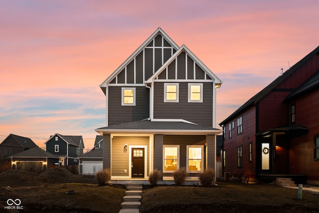 2024 Yandes St, Indianapolis, IN 46202 - view of front of house featuring covered porch and board and batten siding