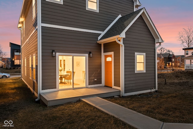 2024 Yandes St, Indianapolis, IN 46202 - back of property at dusk featuring a lawn