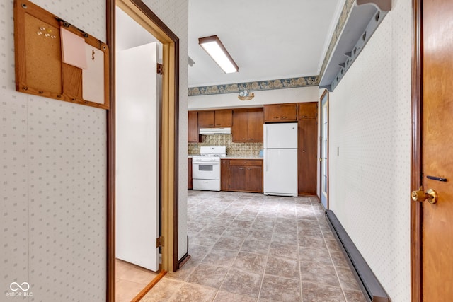 1437 S 725 W, Tipton, IN 46072 - hall featuring wallpapered walls, light stone finish floors, and baseboards