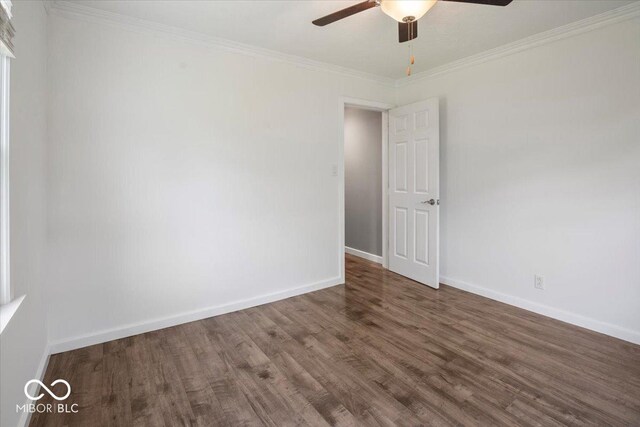 953 W Clinton St, Danville, IN 46122 - spare room featuring ceiling fan, wood finished floors, crown molding, and baseboards