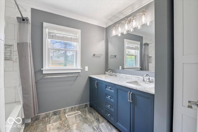 953 W Clinton St, Danville, IN 46122 - bathroom featuring double vanity, crown molding, shower / tub combo, baseboards, and marble finish flooring