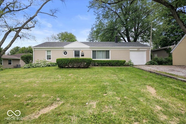953 W Clinton St, Danville, IN 46122 - ranch-style house with driveway, an attached garage, a front lawn, a chimney, and central AC unit