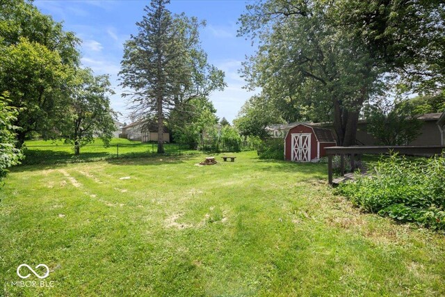 953 W Clinton St, Danville, IN 46122 - view of yard featuring an outdoor fire pit