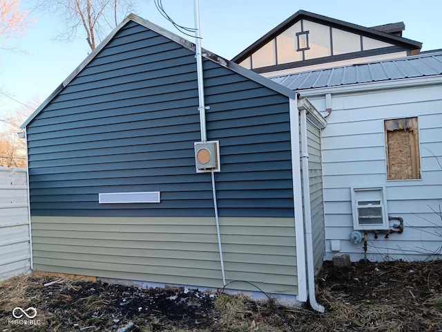 4106 N Pasadena Ave, Indianapolis, IN 46226 - view of side of property with metal roof