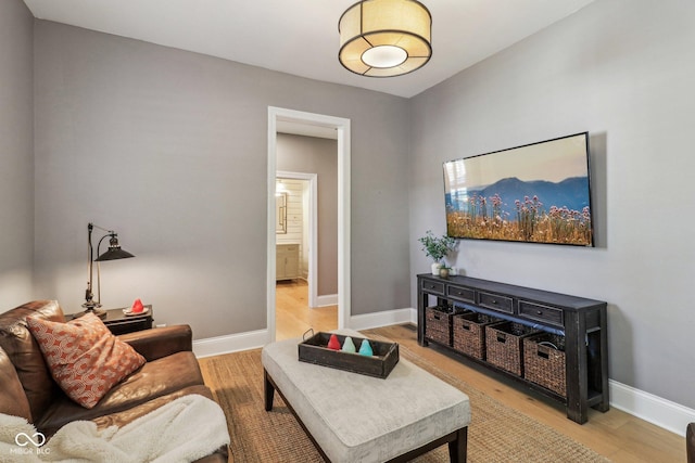1616 N Delaware St, Indianapolis, IN 46202 - living area featuring light wood-style flooring and baseboards