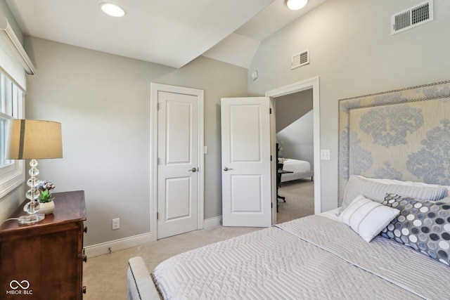 1616 N Delaware St, Indianapolis, IN 46202 - bedroom featuring baseboards, recessed lighting, light carpet, and lofted ceiling