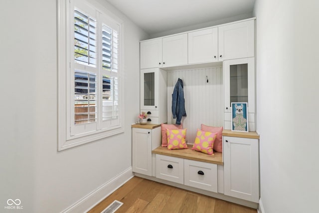 1616 N Delaware St, Indianapolis, IN 46202 - mudroom featuring light wood finished floors and baseboards