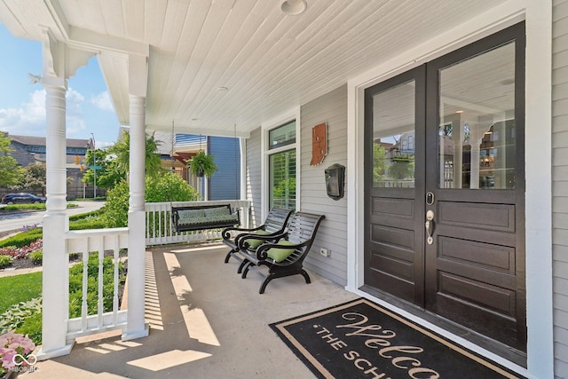 1616 N Delaware St, Indianapolis, IN 46202 - view of patio / terrace featuring a porch and french doors
