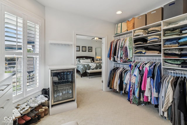 1616 N Delaware St, Indianapolis, IN 46202 - walk in closet with wine cooler, carpet, and ceiling fan