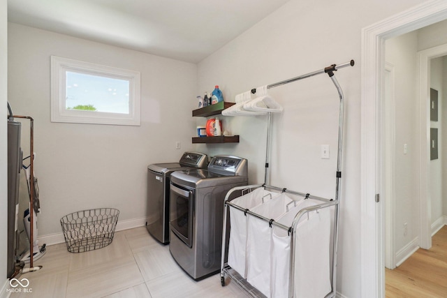 1616 N Delaware St, Indianapolis, IN 46202 - clothes washing area with washing machine and dryer and baseboards